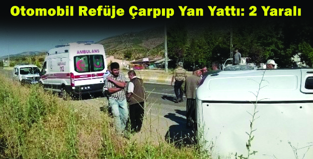 Otomobil Refüje Çarpıp Yan Yattı: 2 Yaralı