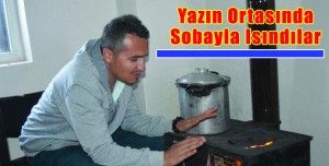 Yazın Ortasında Sobayla Isındılar
